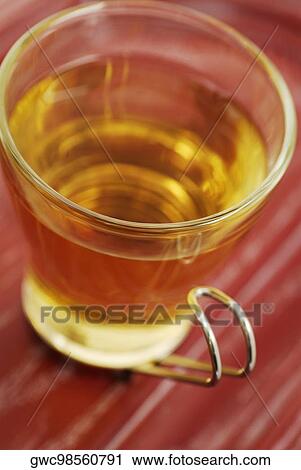 Close-up of a cup of herbal tea View Large Photo Image Stock Image - Close-up of a cup of herbal tea. Fotosearch