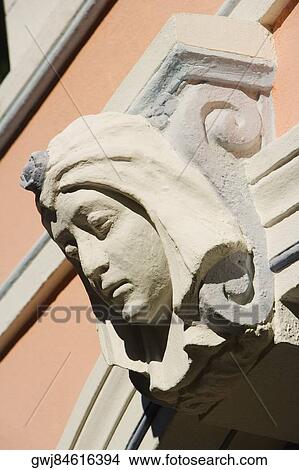 Close-up of a female sculpture engraved on the wall View Large Photo Image Picture - Close-up of a female sculpture engraved on the wall. Fotosearch