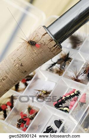 Picture - Close-up of a fishing hook on a fishing rod. Fotosearch
