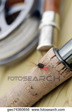 Close-up of a fishing lure on a fishing rod View Large Photo Image Stock Photograph - Close-up of a fishing lure on a fishing rod. Fotosearch