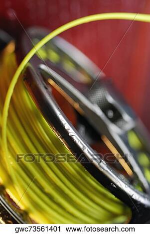 Close-up of a fishing reel View Large Photo Image Stock Image - Close-up of a fishing reel. Fotosearch