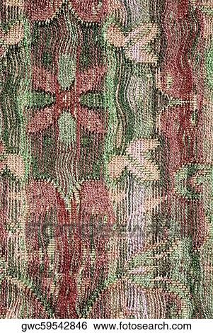 Close-up of a floral pattern on a mat View Large Photo Image Stock Photograph - Close-up of a floral pattern on a mat. Fotosearch
