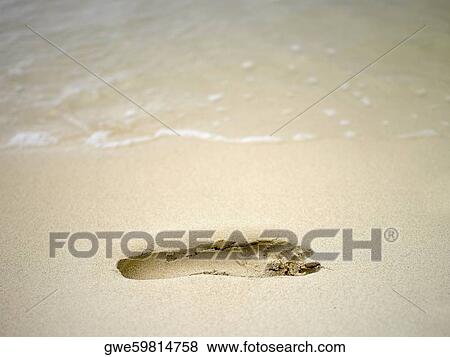 Close-up of a footprint in the sand View Large Photo Image Stock Photo - Close-up of a footprint in the sand. Fotosearch