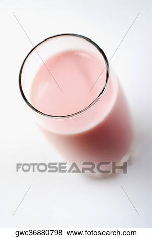 Stock Photo - Close-up of a glass of a milkshake. Fotosearch