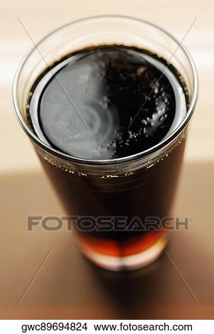 Close-up of a glass of cola View Large Photo Image Picture - Close-up of a glass of cola. Fotosearch