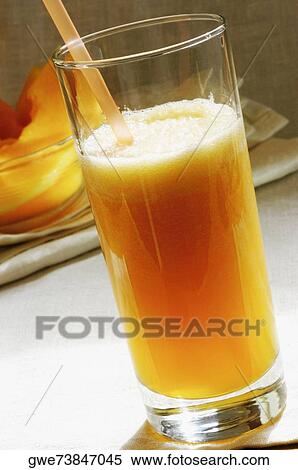 Close-up of a glass of juice View Large Photo Image Stock Photography - Close-up of a glass of juice. Fotosearch