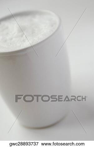 Close-up of a glass of milk View Large Photo Image Stock Photo - Close-up of a glass of milk. Fotosearch