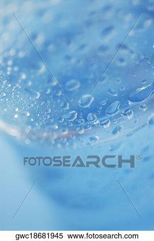 Close-up of a glass of water View Large Photo Image Stock Photography - Close-up of a glass of water. Fotosearch