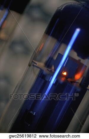 Close-up of a glass tube in an old fashioned radio View Large Photo Image Stock Image - Close-up of a glass tube in an old fashioned radio. Fotosearch