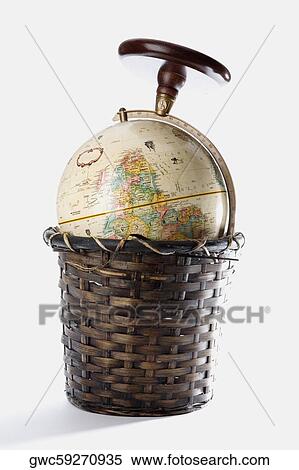 Close-up of a globe in a wicker basket View Large Photo Image Stock Photography - Close-up of a globe in a wicker basket. Fotosearch