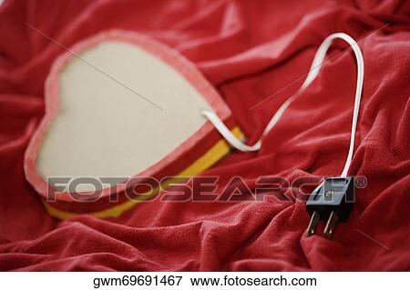 Close-up of a heart shaped lamp View Large Photo Image Stock Photo - Close-up of a heart shaped lamp. Fotosearch
