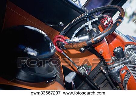 Close-up of a helmet in a sports car View Large Photo Image Stock Photo - Close-up of a helmet in a sports car. Fotosearch
