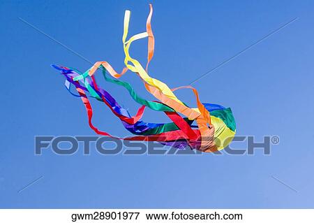 Stock Photo - Close-up of a kite flying in the sky. Fotosearch