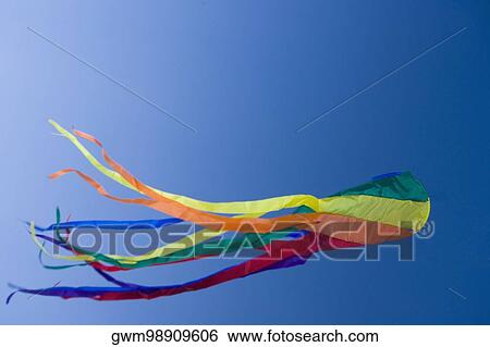 Stock Photograph - Close-up of a kite flying in the sky. Fotosearch