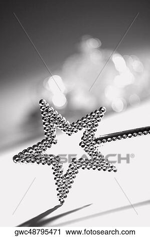 Stock Image - Close-up of a magic wand. Fotosearch