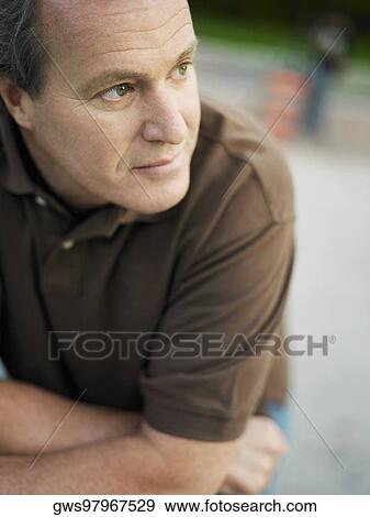 Stock Photo - Close-up of a mature man looking sideways. Fotosearch