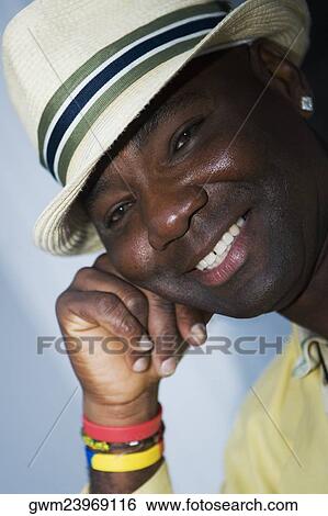 Close-up of a mature man smiling View Large Photo Image Stock Photograph - Close-up of a mature man smiling. Fotosearch