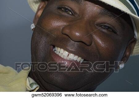 Stock Photograph - Close-up of a mature man smiling. Fotosearch