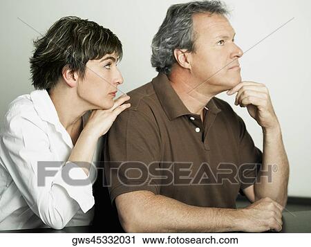 Close-up of a mature woman convincing her husband View Large Photo Image Stock Image - Close-up of a mature woman convincing her husband. Fotosearch