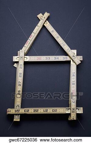 Close-up of a measuring scale in the shape of a house View Large Photo Image Stock Photograph - Close-up of a measuring scale in the shape of a house. Fotosearch