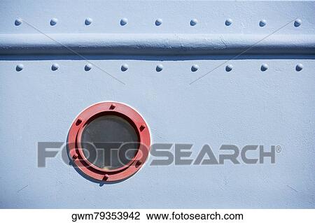 Close-up of a metal surface with a circular window View Large Photo Image Stock Image - Close-up of a metal surface with a circular window. Fotosearch
