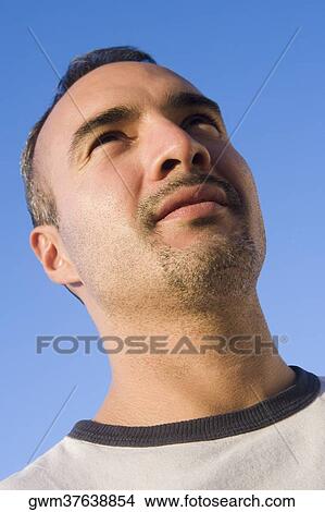 Close-up of a mid adult man View Large Photo Image Picture - Close-up of a mid adult man. Fotosearch