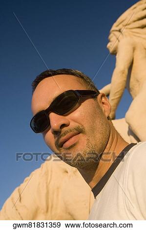 Stock Photo - Close-up of a mid adult man. Fotosearch