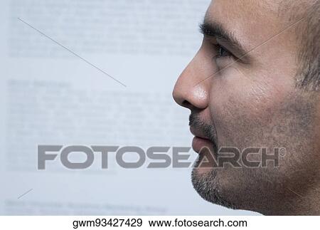 Stock Photo - Close-up of a mid adult man. Fotosearch