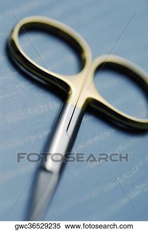 Close-up of a pair of scissors View Large Photo Image Stock Photography - Close-up of a pair of scissors. Fotosearch