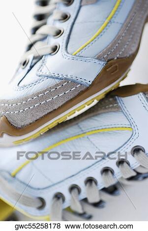 Stock Photo - Close-up of a pair of sports shoes. Fotosearch