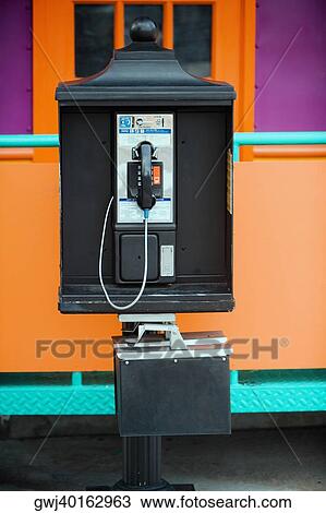 Stock Image - Close-up of a pay phone. Fotosearch