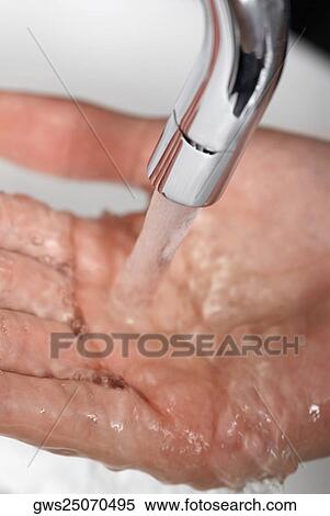 Close-up of a person washing hands View Large Photo Image Stock Photography - Close-up of a person washing hands. Fotosearch