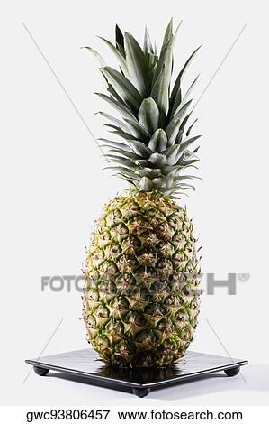 Close-up of a pineapple View Large Photo Image Stock Photo - Close-up of a pineapple. Fotosearch