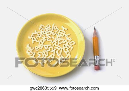 Close-up of a plate and a pencil View Large Photo Image Stock Photo - Close-up of a plate and a pencil. Fotosearch