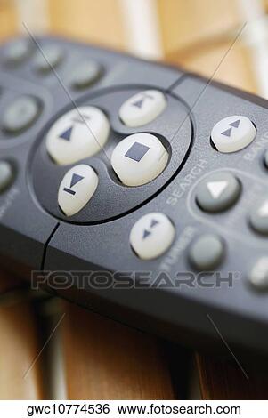 Close-up of a remote control View Large Photo Image Stock Photograph - Close-up of a remote control. Fotosearch