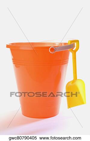 Close-up of a sand pail and a shovel View Large Photo Image Stock Photography - Close-up of a sand pail and a shovel. Fotosearch