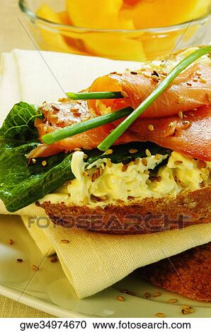 Close-up of a sandwich on a plate View Large Photo Image Stock Image - Close-up of a sandwich on a plate. Fotosearch