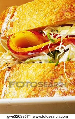 Close-up of a sandwich on a platter View Large Photo Image Picture - Close-up of a sandwich on a platter. Fotosearch