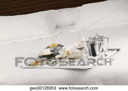 Close-up of a serving tray on the bed View Large Photo Image Stock Image - Close-up of a serving tray on the bed. Fotosearch