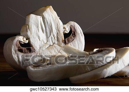 Close-up of a sliced mushroom View Large Photo Image Stock Image - Close-up of a sliced mushroom. Fotosearch