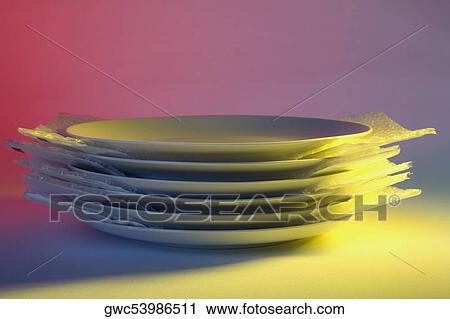 Close-up of a stack of plates View Large Photo Image Stock Image - Close-up of a stack of plates. Fotosearch