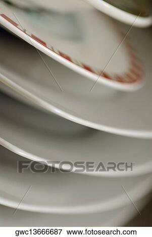 Close-up of a stack of plates View Large Photo Image Stock Photo - Close-up of a stack of plates. Fotosearch