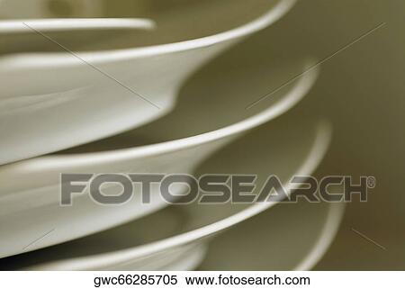 Close-up of a stack of plates View Large Photo Image Stock Photography - Close-up of a stack of plates. Fotosearch