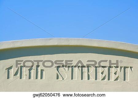 Close-up of a street name carved on the wall View Large Photo Image Stock Photograph - Close-up of a street name carved on the wall. Fotosearch