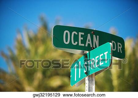 Close-up of a street name sign View Large Photo Image Stock Photo - Close-up of a street name sign. Fotosearch