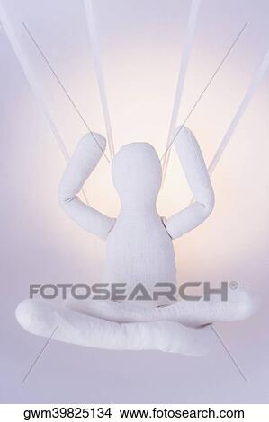 Close-up of a stuffed toy sitting with cross-legged View Large Photo Image Picture - Close-up of a stuffed toy sitting with cross-legged. Fotosearch