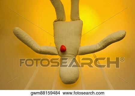 Close-up of a stuffed toy with a heart shaped candy on it View Large Photo Image Picture - Close-up of a stuffed toy with a heart shaped candy on it. Fotosearch