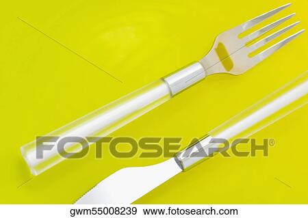 Stock Photo - Close-up of a table knife and a fork. Fotosearch