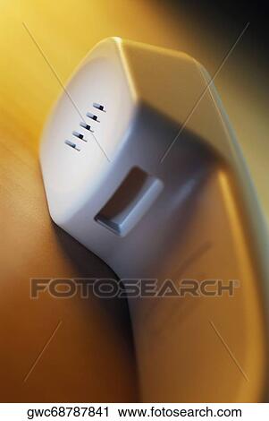 Stock Image - Close-up of a telephone receiver. Fotosearch