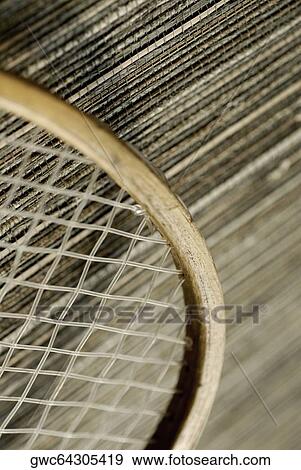 Stock Photo - Close-up of a tennis racket. Fotosearch